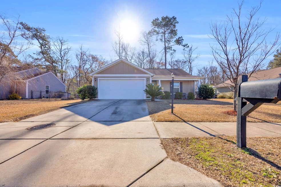 Single story home with a garage
