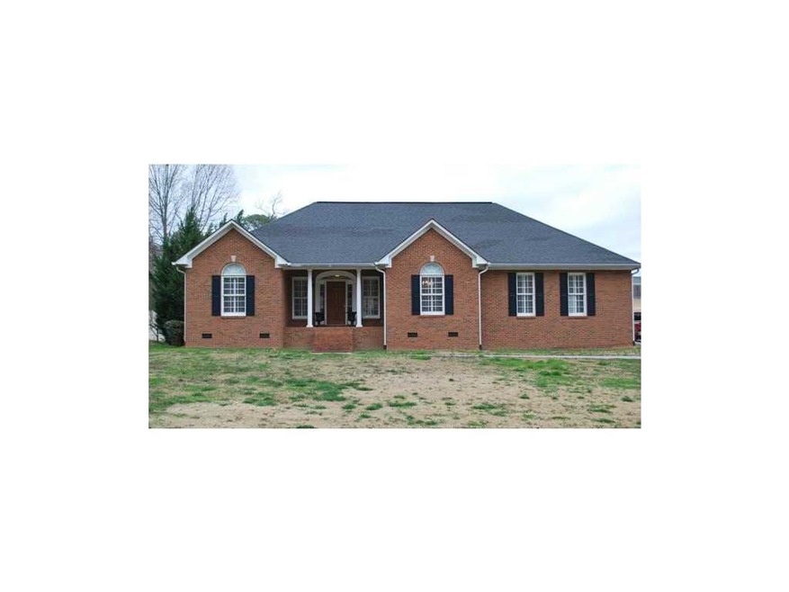 Exterior Front. Four-sided brick beauty - nearly n