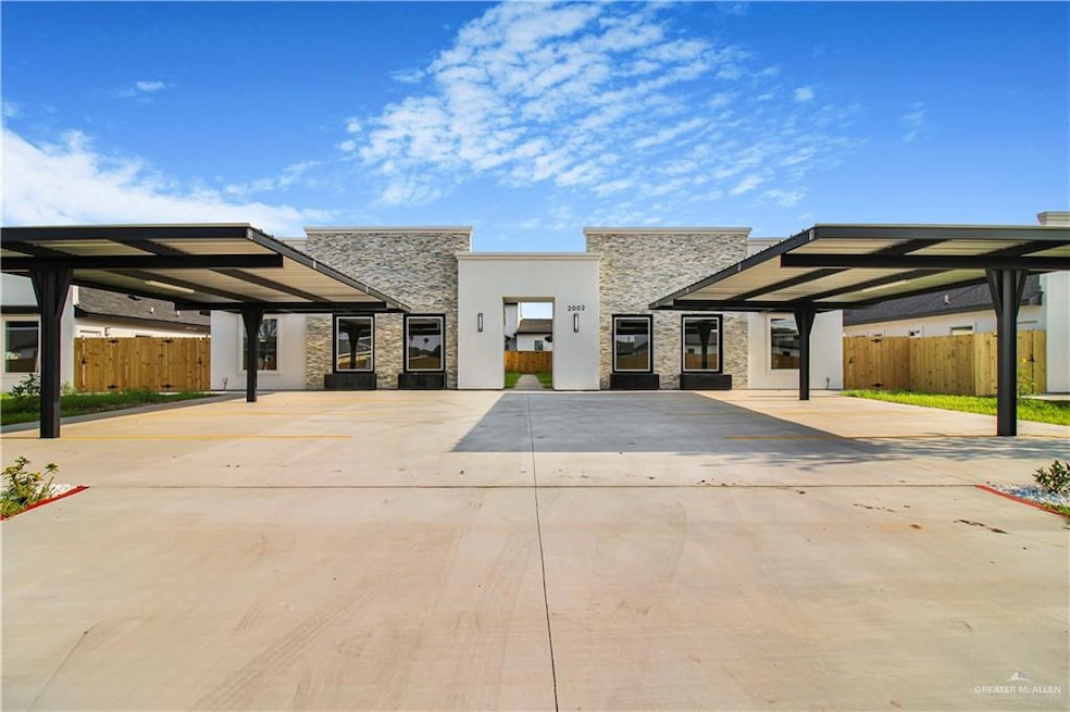 View of front of house with stone siding