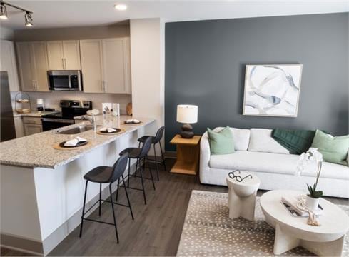 Kitchen featuring dark hardwood / wood-style floor
