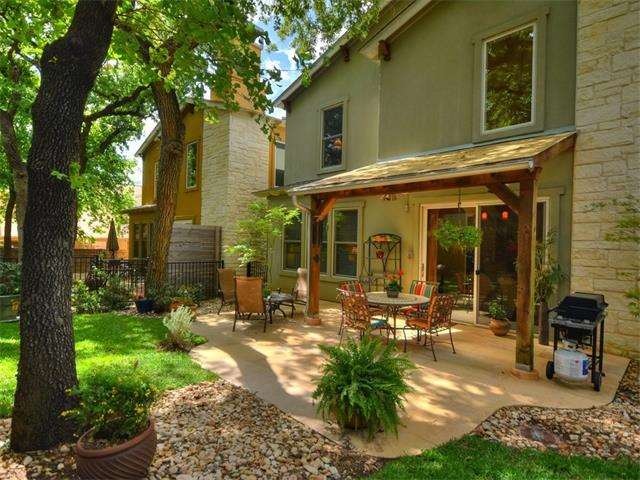 Tucked away from the street, the back yard of this