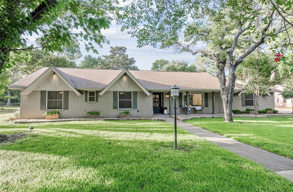 Welcome home to this lovely one story on a spacious and lushly landscaped lot