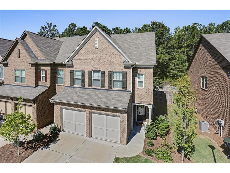 Beautiful brick end unit with landscaped front and
