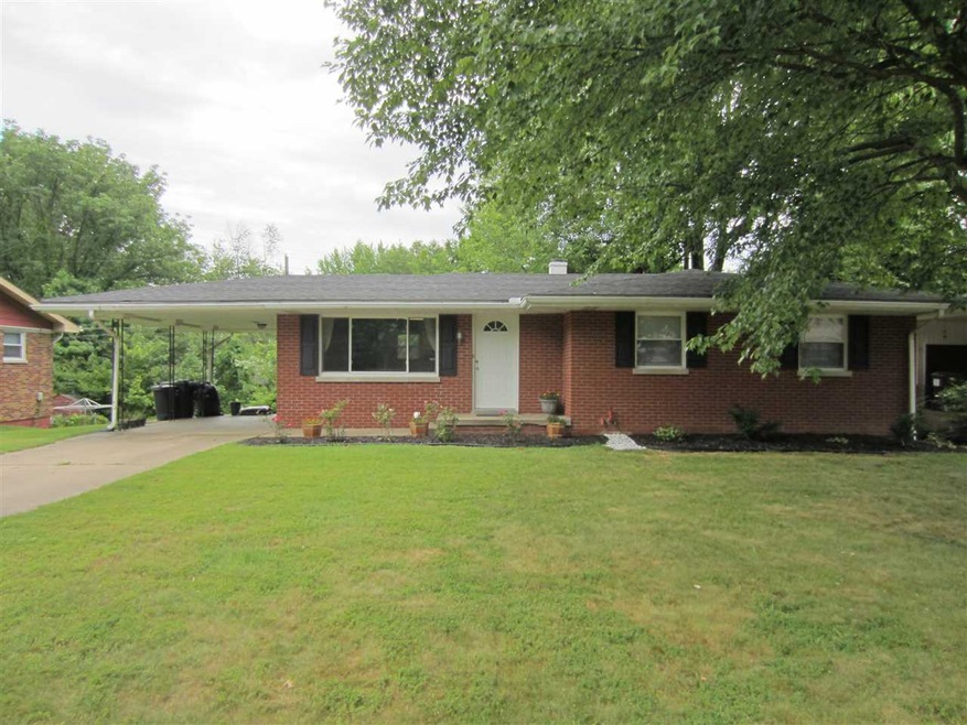 Stunning updates in this all brick ranch with fini