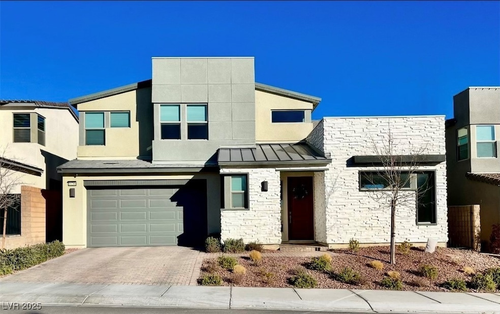 View of front of house featuring a standing seam r