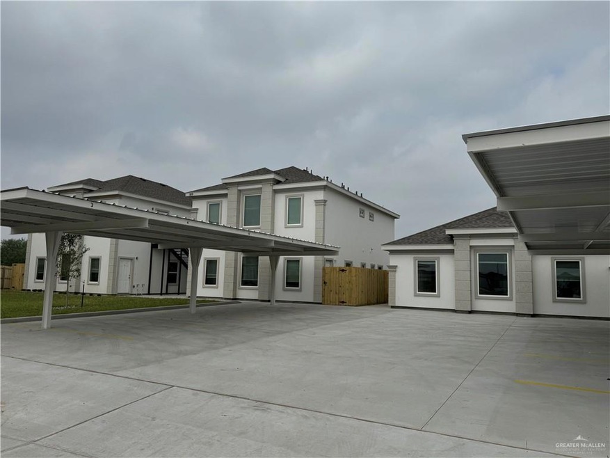 View of front of home featuring roof with shingles