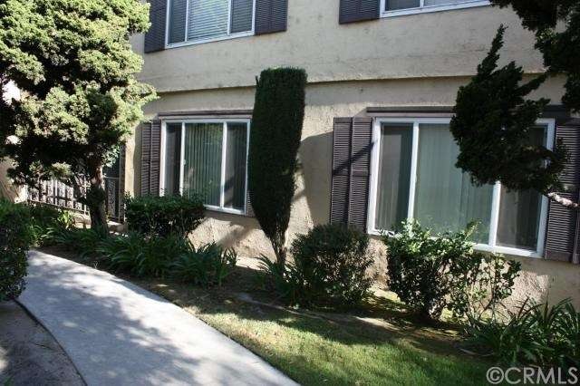 Exterior of the two bedroom windows and partial pa