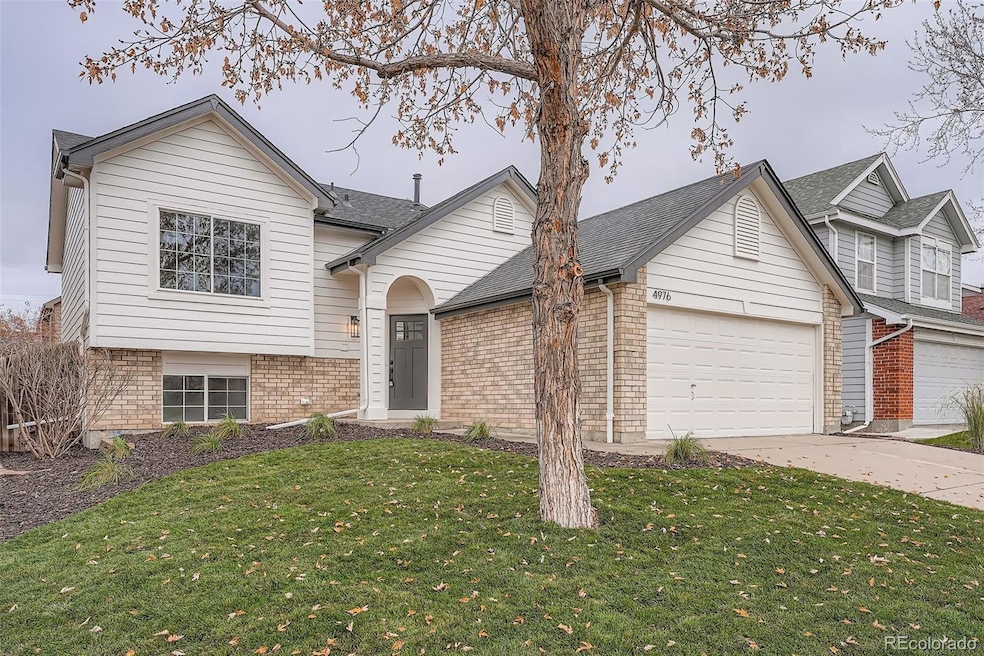 4976 Fraser Way, Denver, CO 80239 - photo 1