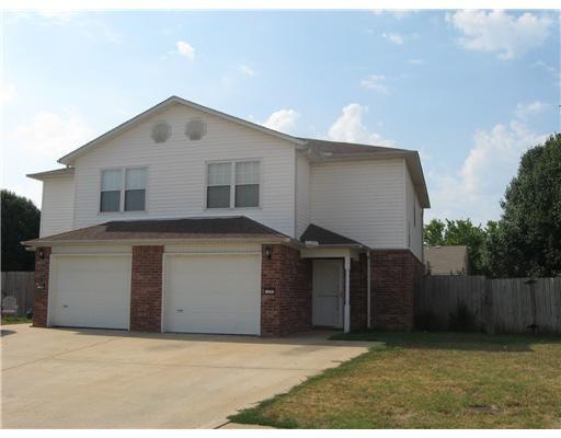 Exterior Front. 169 & 171 Plover Cove is a spacious 2 level duplex. 171 has new flooring, paint, fixtures, vanities.