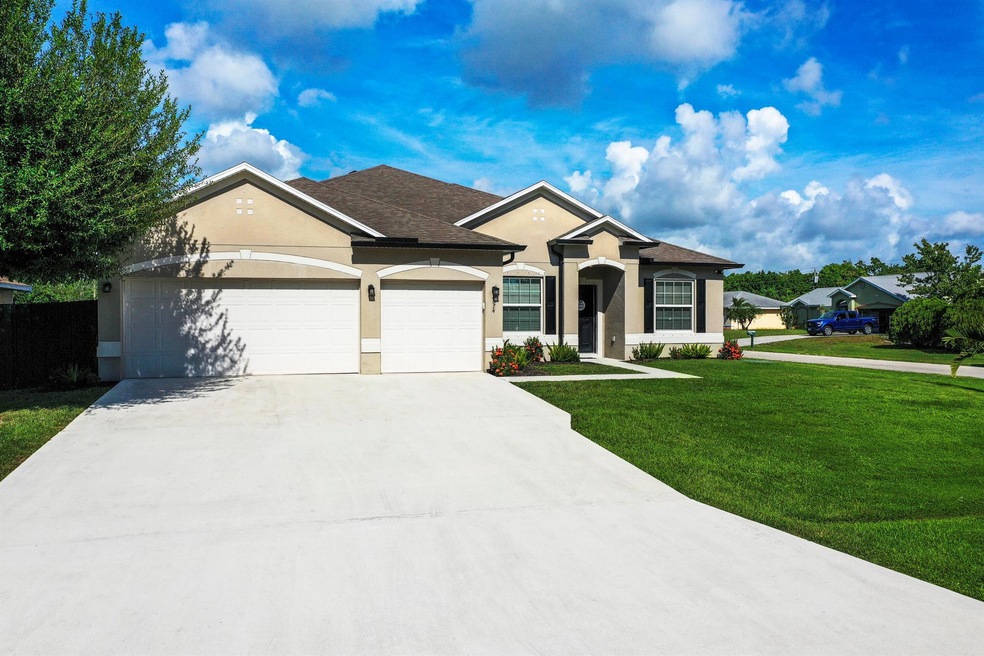 4074 SW Kamsler St, Port Saint Lucie, FL 34953 - photo 1