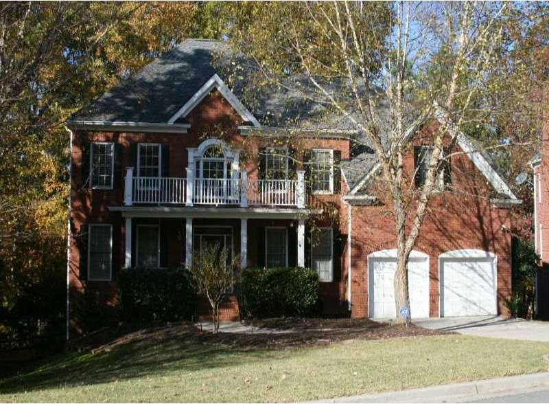 Exterior Front. Traditional with brick front and i