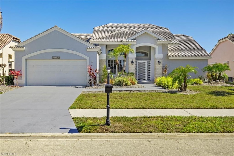Mediterranean / spanish-style home with a tile roo