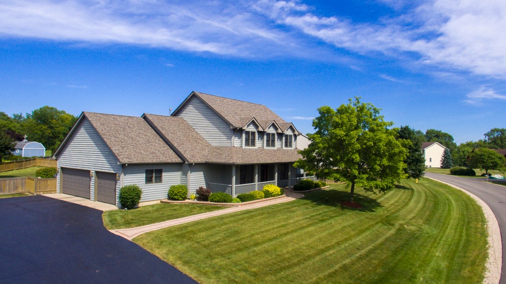 Over half acre professionally landscaped