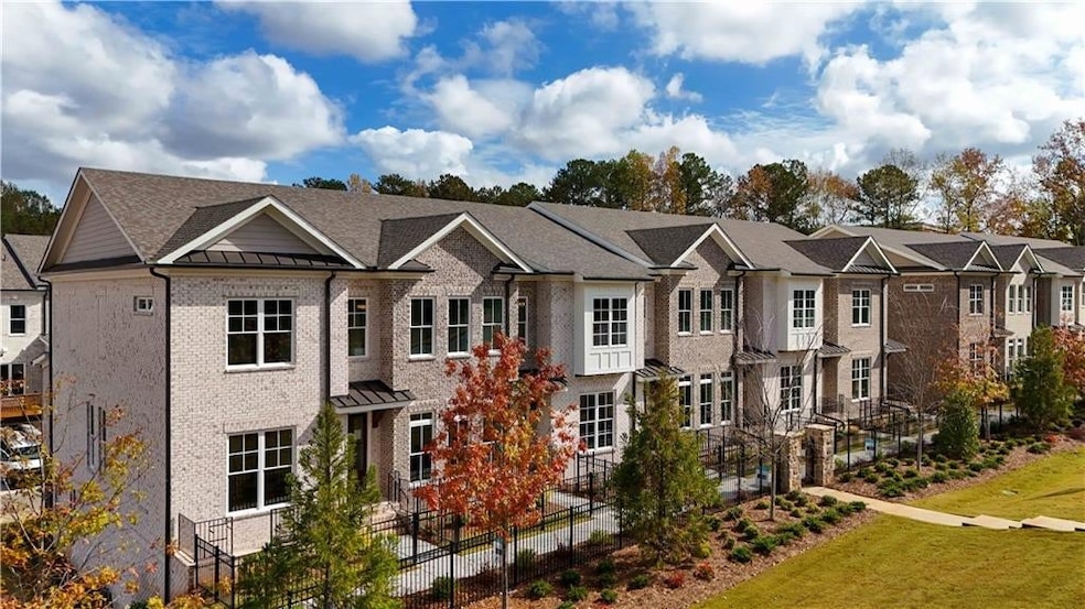 View of front of house with a residential view, a standing seam roof, brick siding, and a metal roof