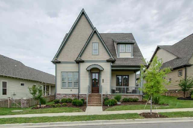 Beautiful cottage style home with covered front po