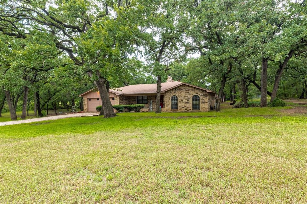 Large front yard, home sits back off road