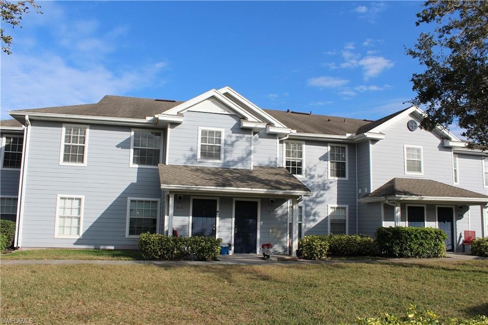 View of property featuring a front yard