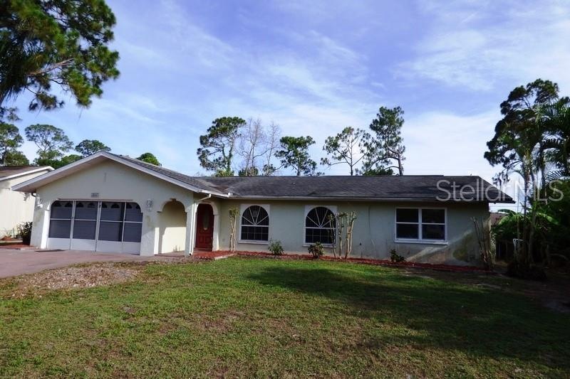 1047 Tropical Ave NW, Port Charlotte, FL 33948 - photo 1