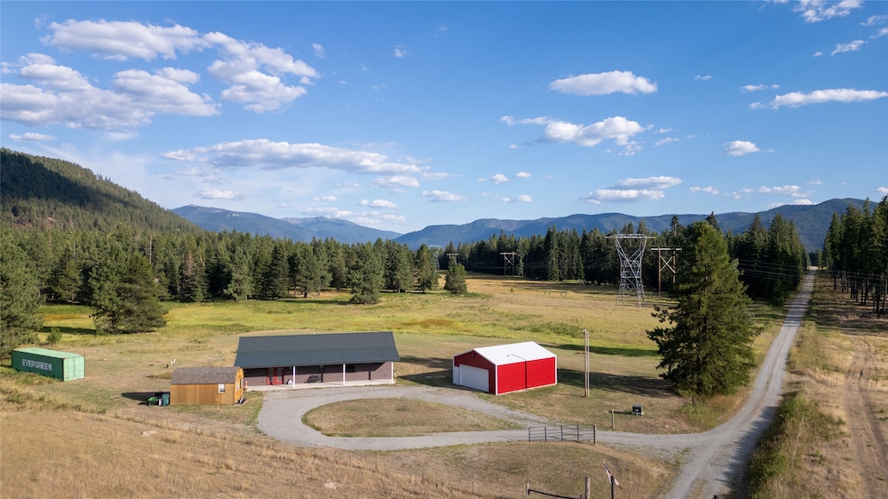 5 acres, home, shop, shed, & storage container