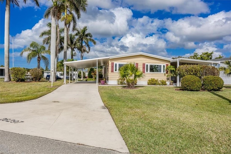 View of front of house featuring a carport and a f