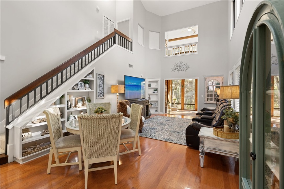 Living room/dining with so many windows!