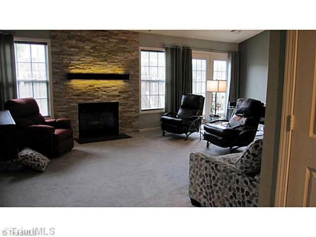 Den/Family/Great Room. Stack Stone Fireplace with LED lighting in mantel