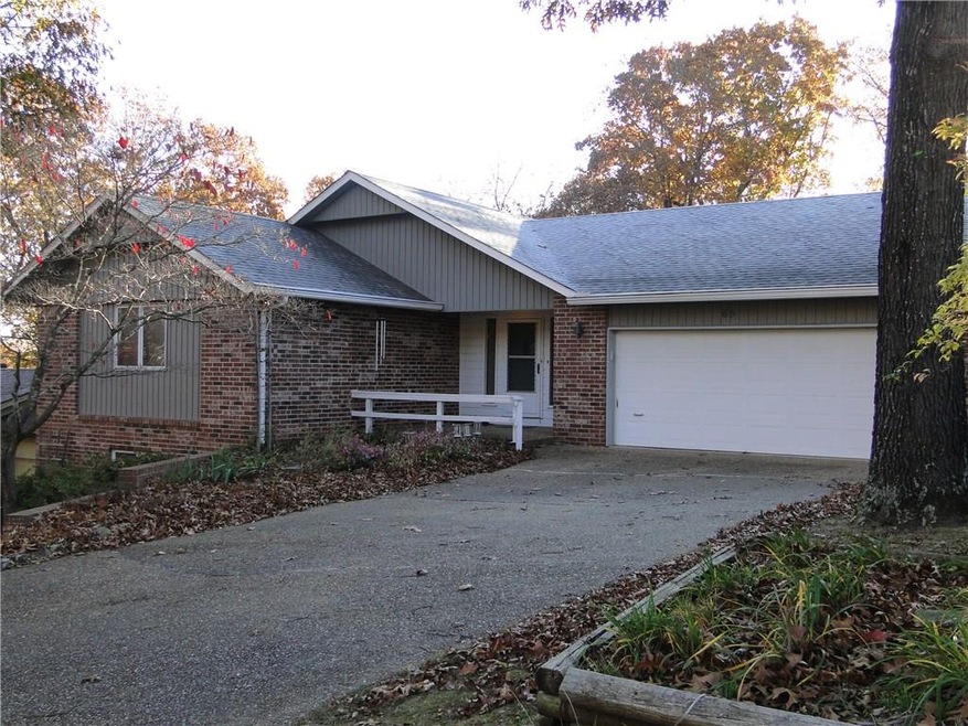 This spacious home has a great location, mature trees and added curb appeal.