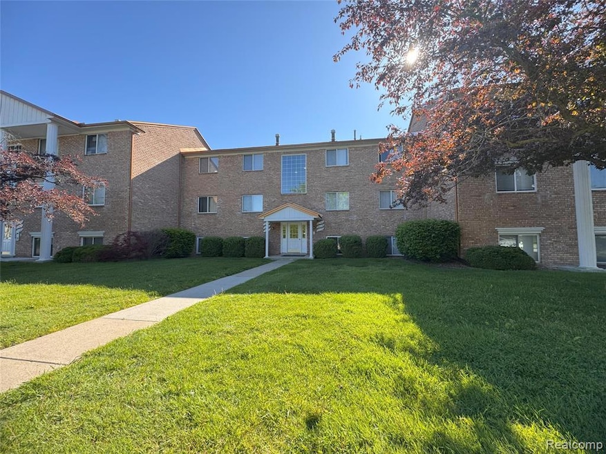 Brick exterior with newer roof and gutters