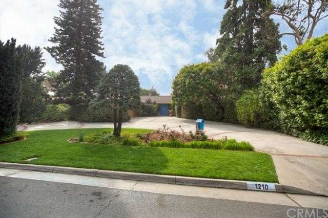 This custom home sits back on the lot, very privat