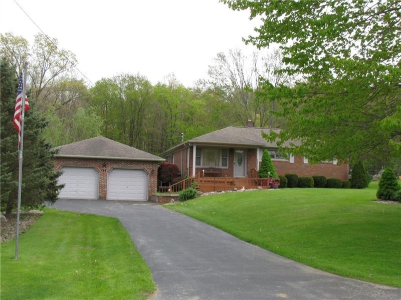 Newer 2 car attached garage.  Brick home on an acr