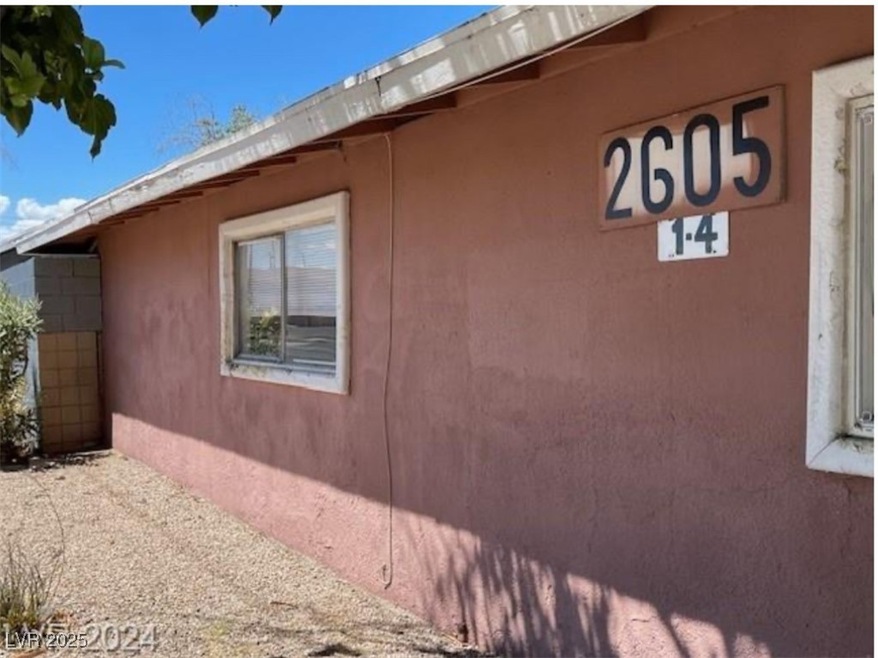 View of property exterior with stucco siding