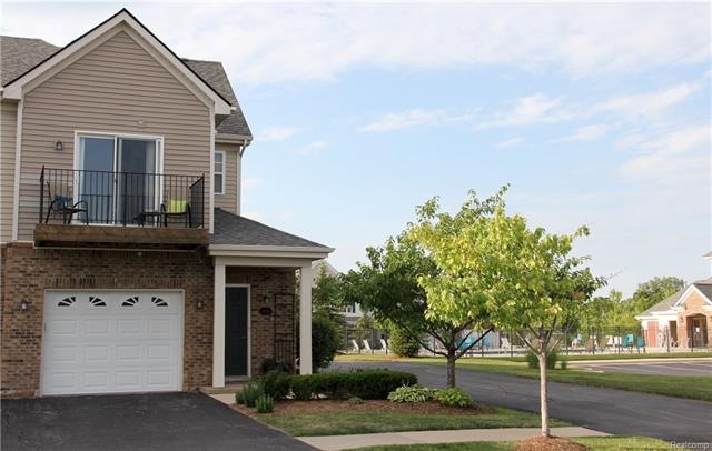 UPPER LEVEL END UNIT RANCH WITH VIEW OF QUIET COMM