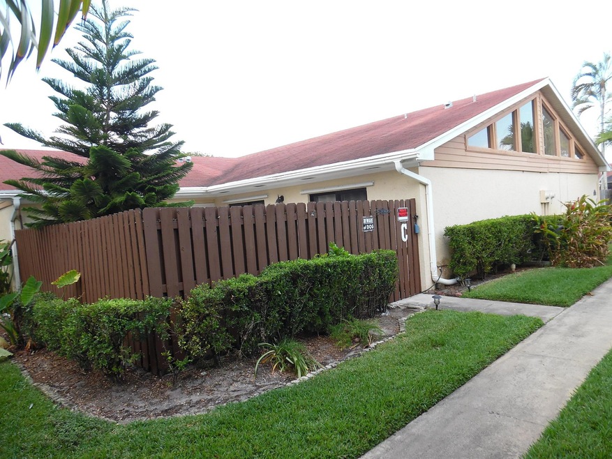 4397 Woodstock Dr unit C, West Palm Beach, FL 33409 - photo 1