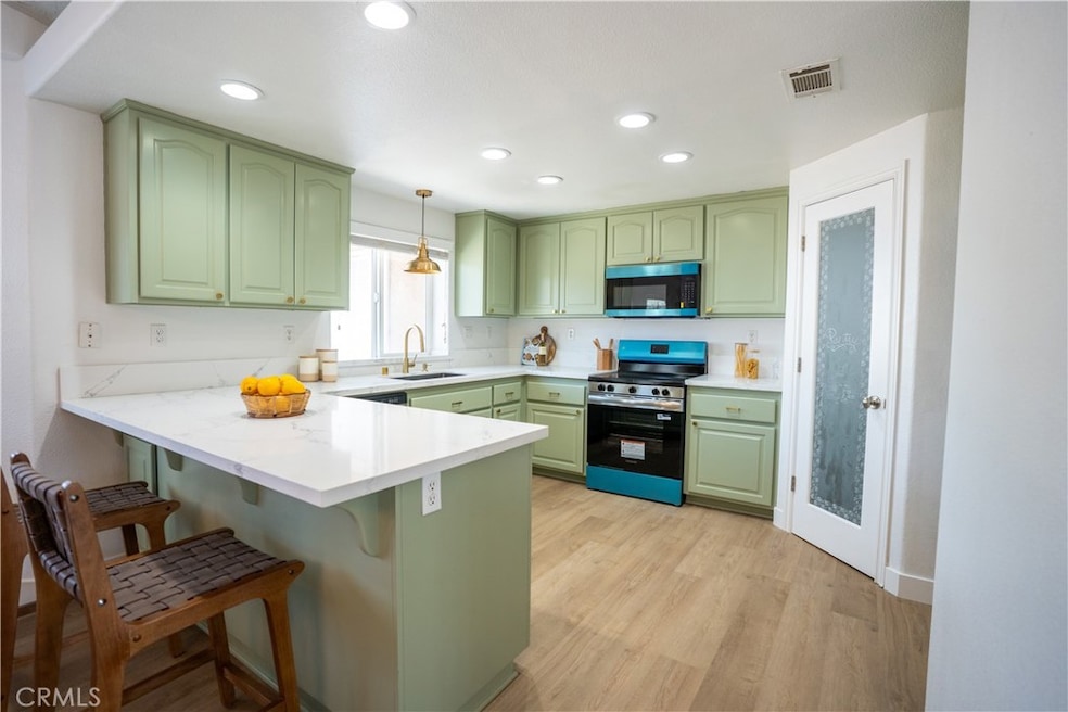 new kitchen with quartz countertops