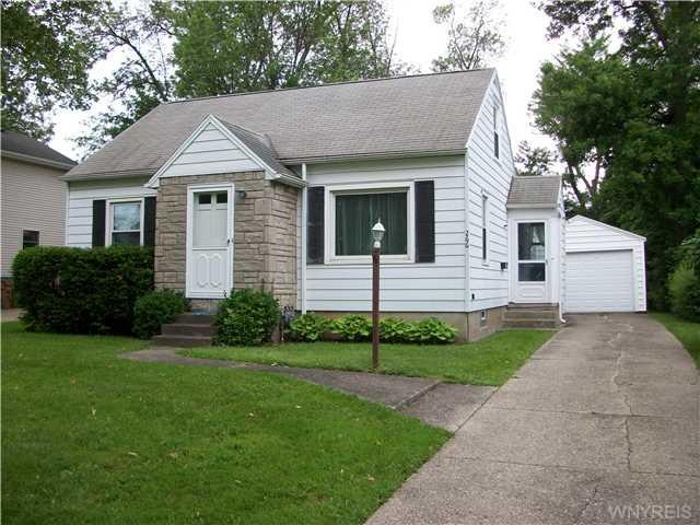Exterior Front. Very nice 4 bedroom Cape Cod home.