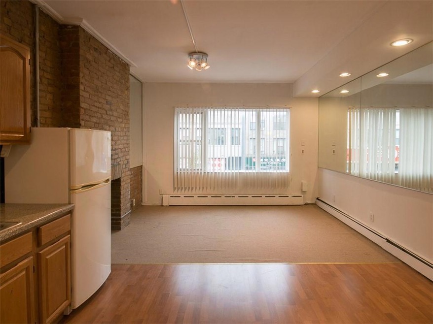 Livingroom faces 18 Ave long 20 ‘ room combo kitchen dining room