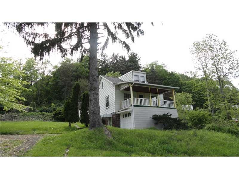 Exterior Front. Cute, cozy cottage type home on a 