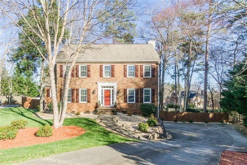 WELCOME HOME TO THIS LOVINGLY UPDATED FOUR BEDROOM
