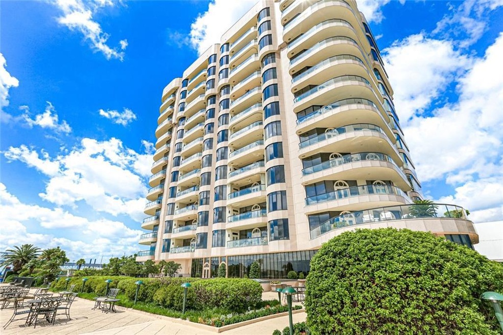 Exterior facing river and terrace for casual dinin