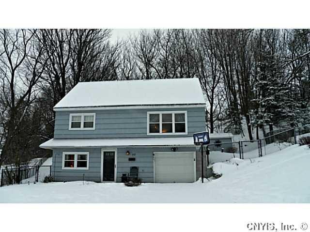 Exterior Front. Fenced in back yard with storage s