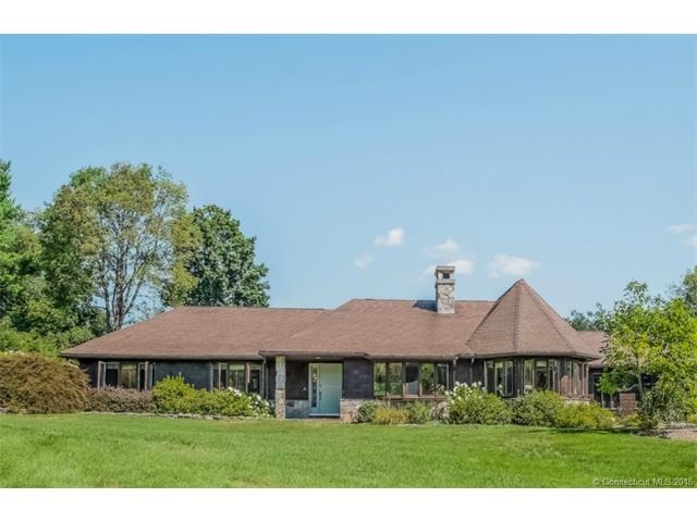 One Floor living expanded ranch abutting 40 acres 