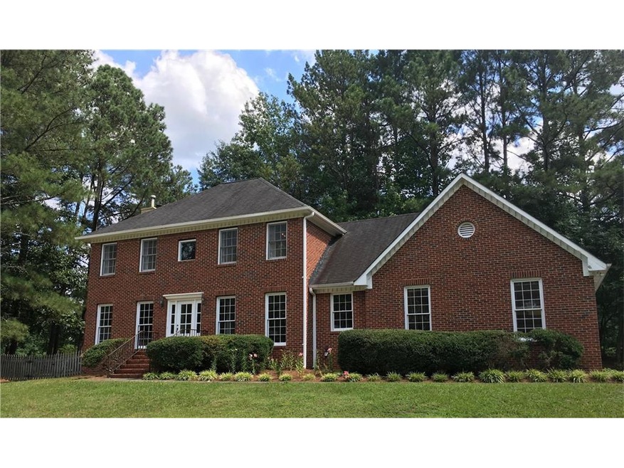 Brick front on huge corner lot
