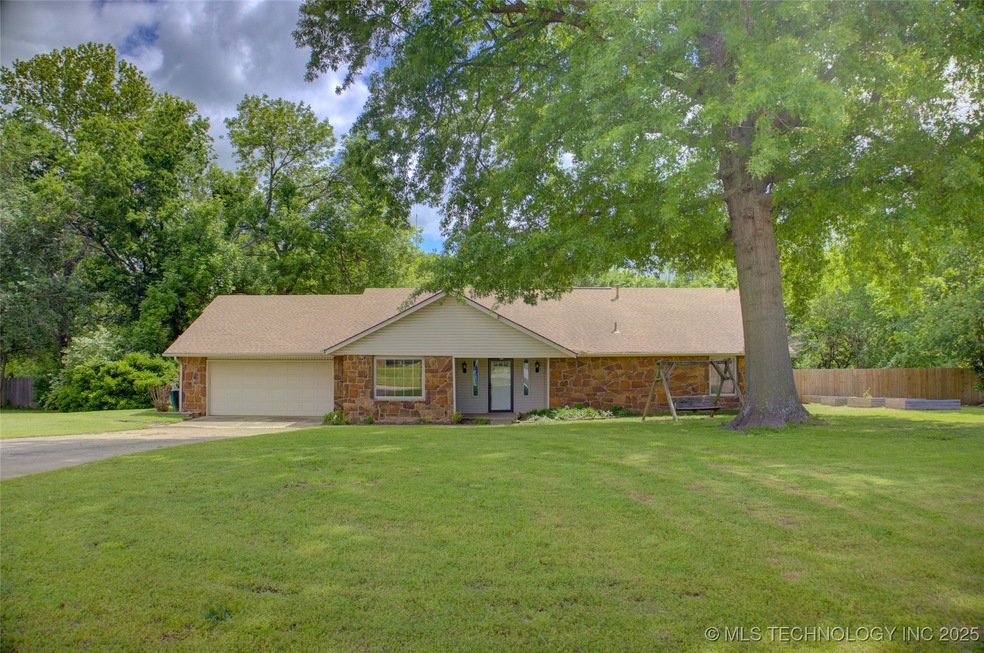 Nice big lot has a large oak shade tree.