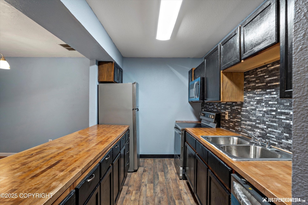 1711 Russian Jack Dr unit B4, Anchorage, AK 99508 - photo 1