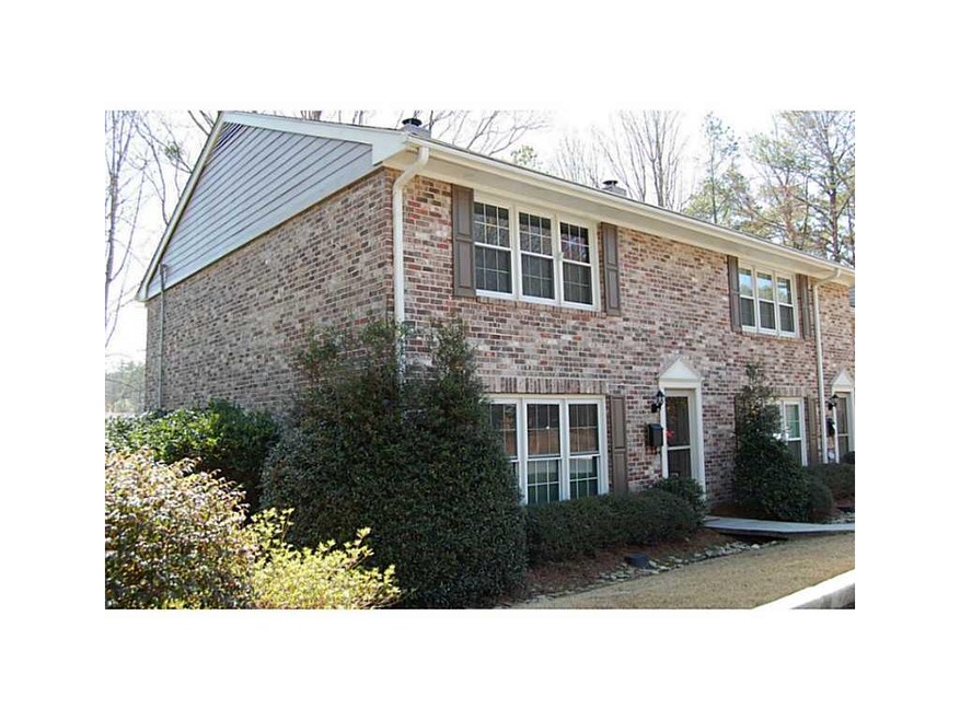 Exterior Front. Re-done end unit  in private all-e