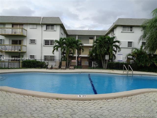 Palm Court Apartments unit D212, Miami, FL 33162 - photo 1