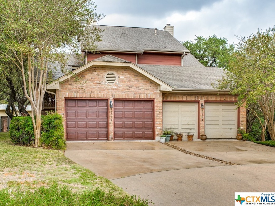 Condo is on left. New garage doors. All units will