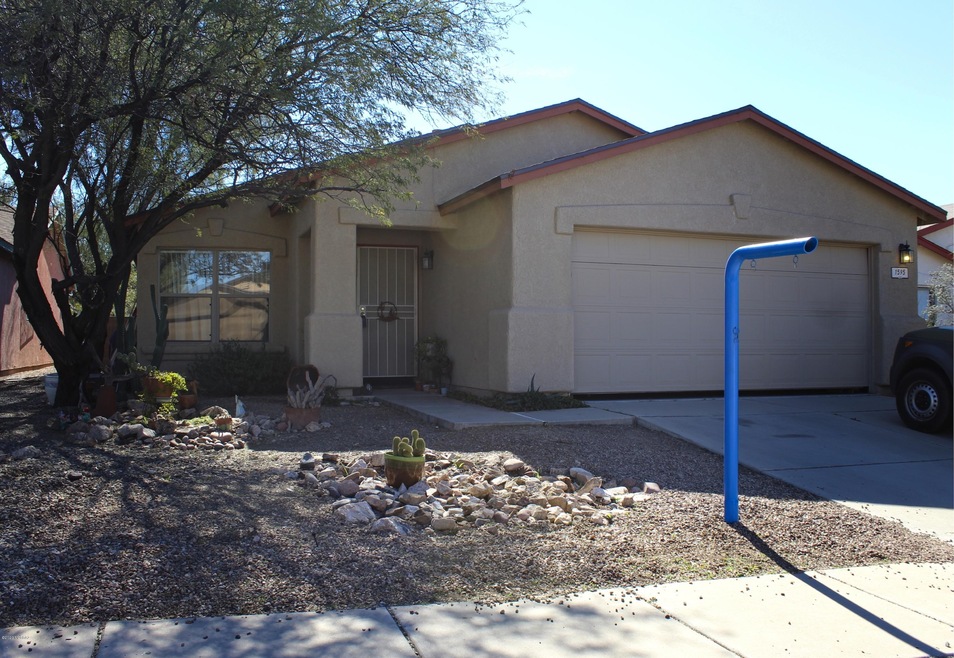 1_House ~ Front w car