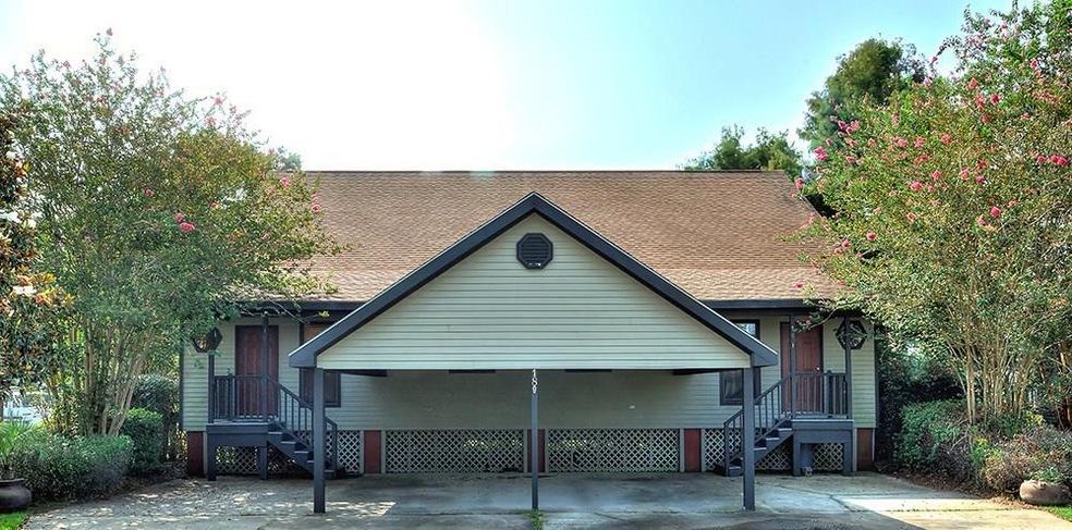 Front entrance with covered parking for both units