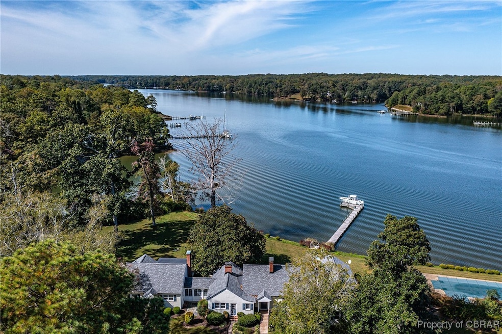 Aerial view of property and surrounding area with